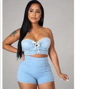 Two piece set,Tube top Padded cups 
Lace up detail